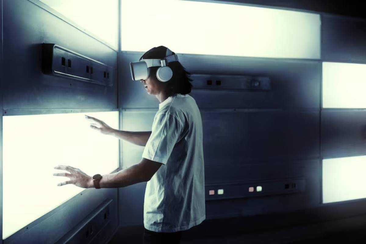 A person wearing a VR headset interacts with glowing screens in a futuristic, minimalistic room.